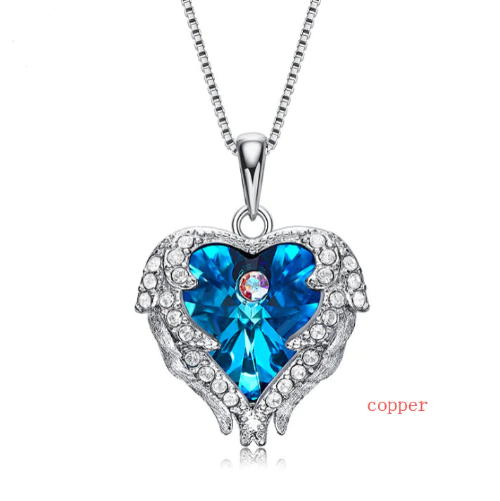 Swarovski Crystal Heart Angel Necklace – Luxurious silver necklace with an angel heart.