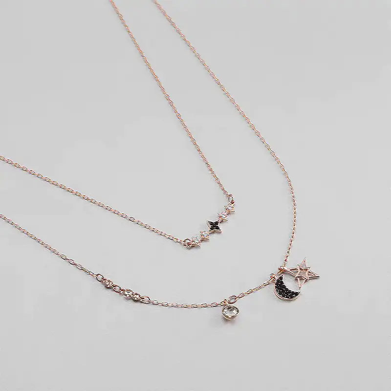 Naszyjnik warstwowy „Star & Moon” z kryształami Swarovski.
