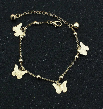 Letnia bransoletka na kostkę z różą, ważką, motylem i muszlami – damska biżuteria z kamieniami