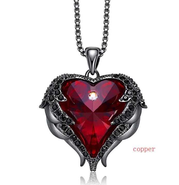 Swarovski Crystal Heart Angel Necklace – Luksusowy srebrny naszyjnik z anielskim sercem.