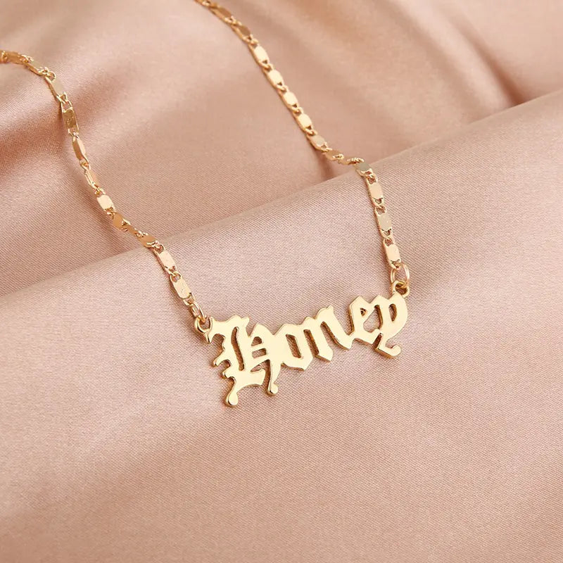Gold-tone stainless steel necklaces – “Angel” and “Princess”.