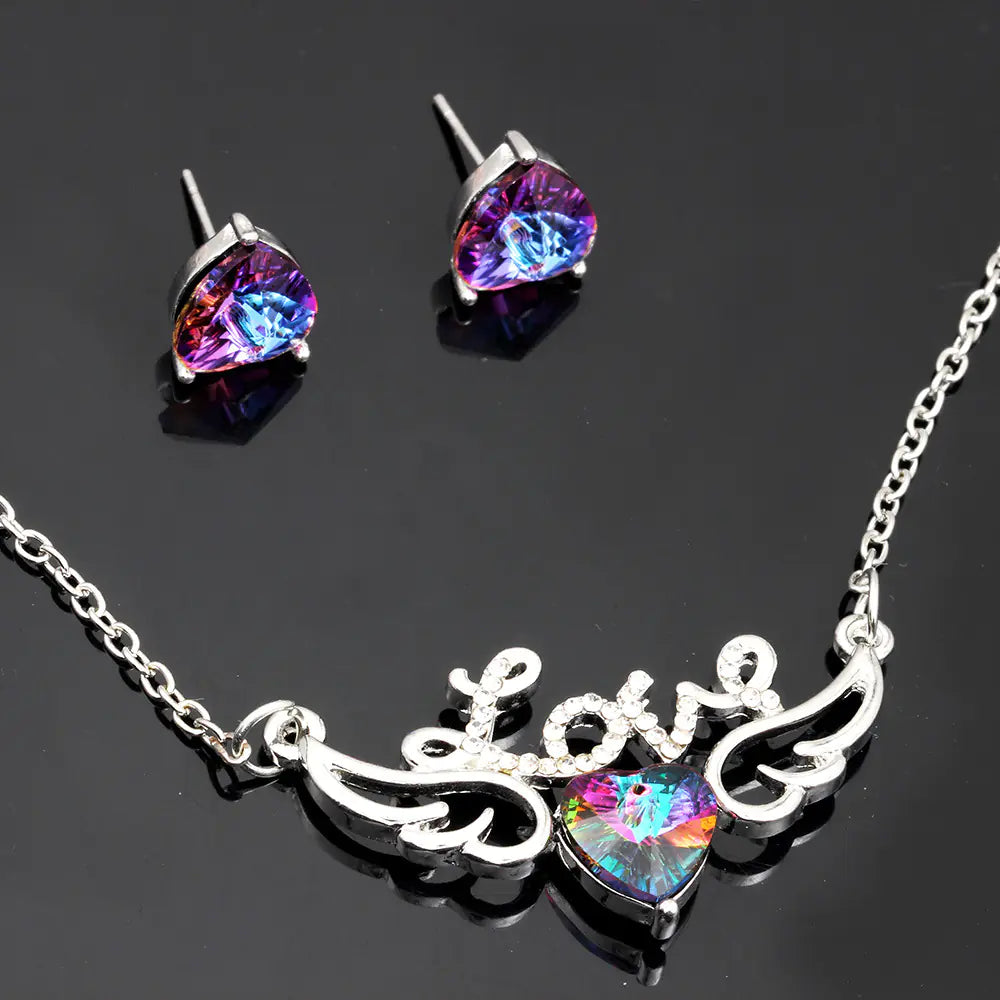 Zestaw naszyjnik i kolczyki z zawieszką w kształcie serca, zdobione kryształami Swarovski.