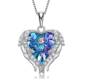 Swarovski Crystal Heart Angel Necklace – Luxurious silver necklace with an angel heart.