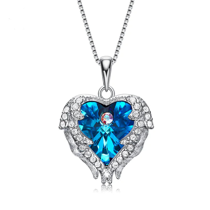 Swarovski Crystal Heart Angel Necklace – Luksusowy srebrny naszyjnik z anielskim sercem.