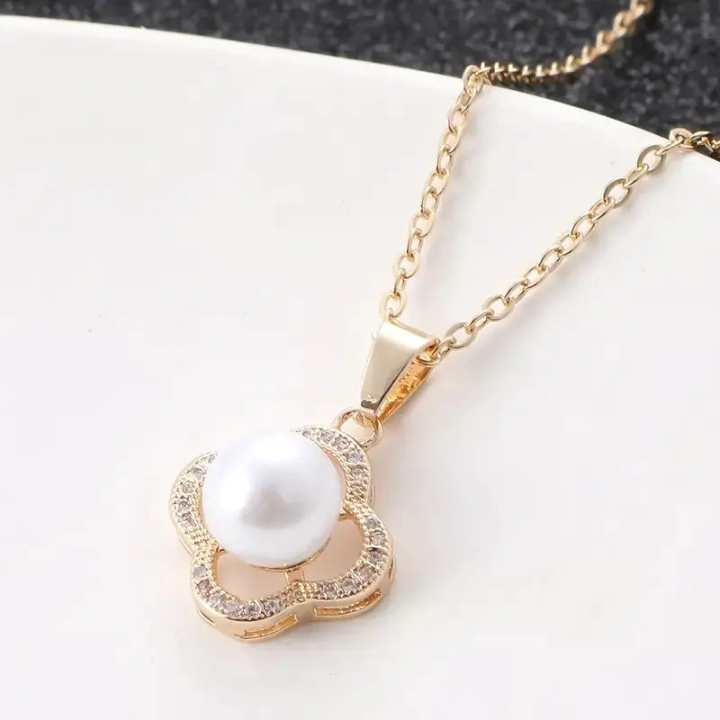 Zestaw biżuterii pozłacany 14K – 3 elementy z kwiatami z cyrkonii