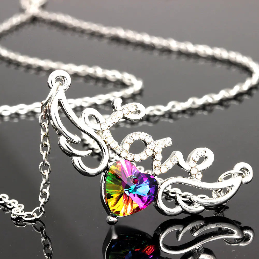 Zestaw naszyjnik i kolczyki z zawieszką w kształcie serca, zdobione kryształami Swarovski.